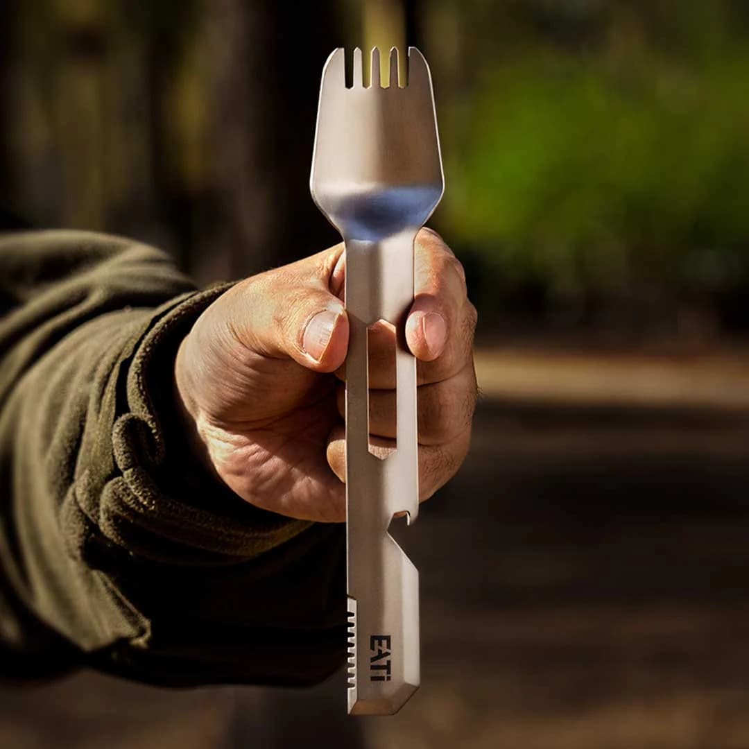 EATi One held in hand — full product view